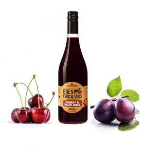 Pure Cherry & Plum Juice 750ml Glass bottle with plum and cherry fruits in the background