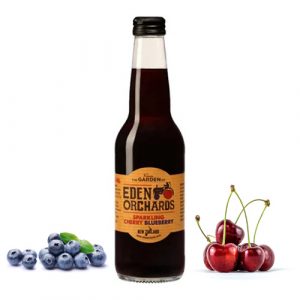Refreshing Sparkling cherry & Blueberry Juice 330ml with cherry and blueberry fruits in the background
